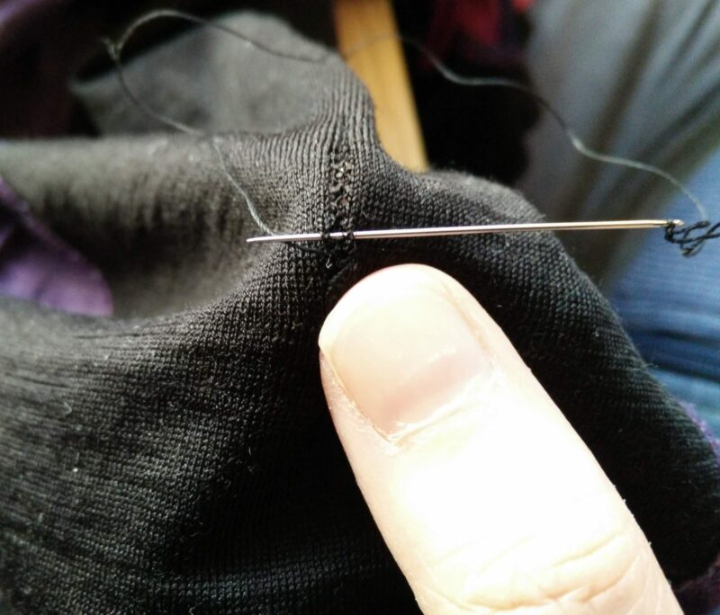With the outside out, carefully connect the two healthy edges around the hole by sewing horizontally.