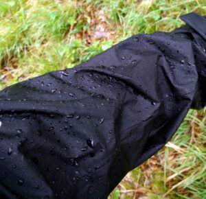 Beading effect on DWR-treated rain jacket