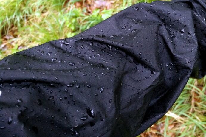 Beading effect on DWR-treated rain jacket