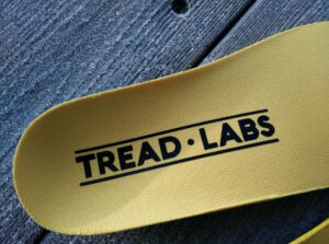 Tread Labs Dash Insole: Logo printed on the polyester lining of the top cover