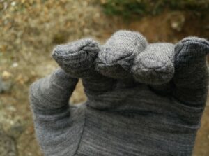 Isobaa Merino Liner Gloves: Stitches come with a lot of excess fabric which decrease the dexterity to some extent