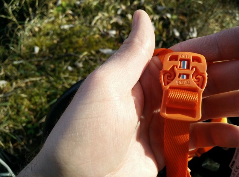 Petzl Sirocco Climbing Helmet: The magnetic buckle on the chin strap