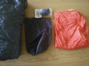 Kammok Firebelly Trail Quilt: From left to right; quilt, stuff sack, accessories and fabric footbox