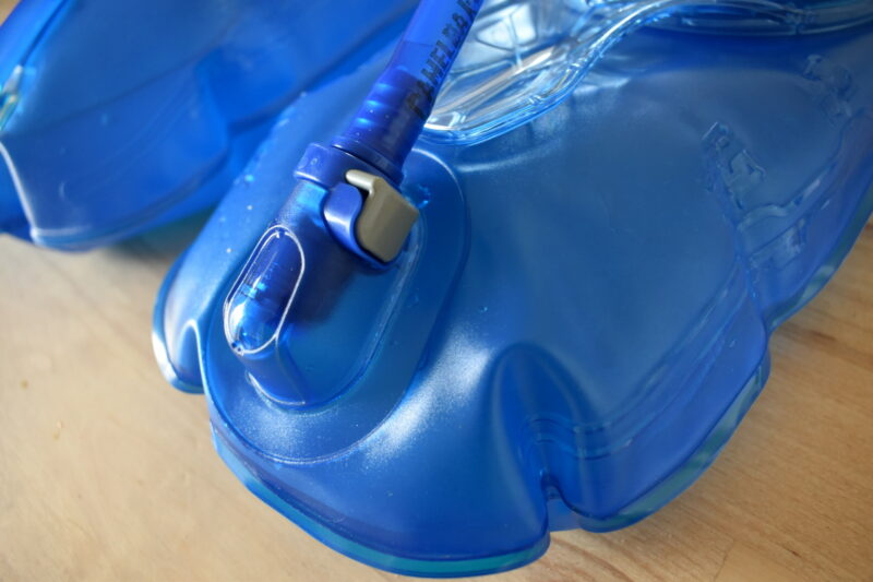 CamelBak Crux Reservoir: Button that detaches the tube