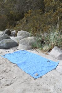 Amberoot Backpacking Towel - so lightweight it has to be weighed down