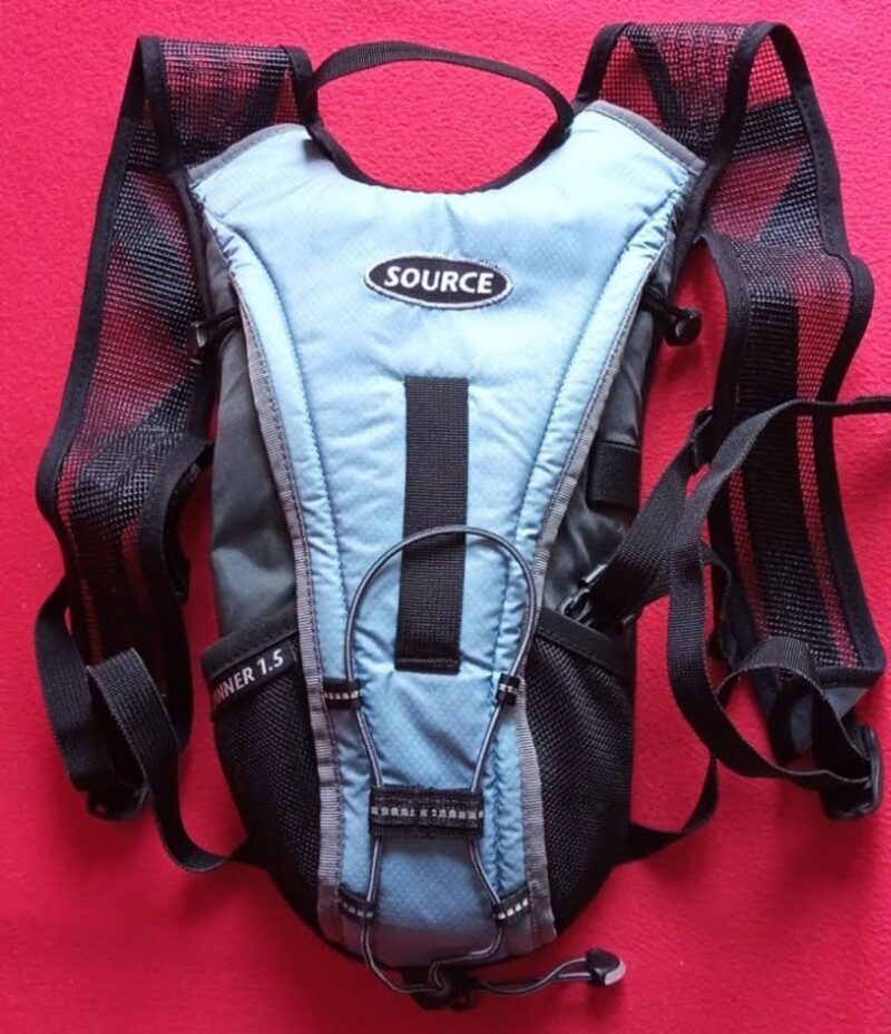 You adjust a hydration pack by making the shoulder straps longer or shorter