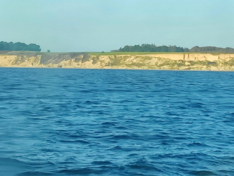Tunø Hiking Trail - a blured view on Tunø's coastal cliffs from the ferry's porthole