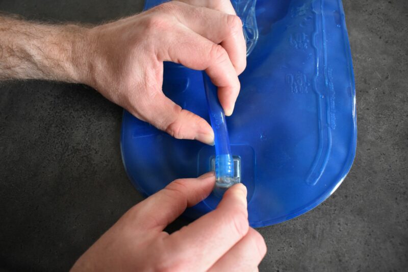 Fixed tube on a hydration bladder