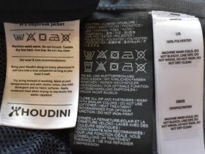 How to Wash DWR-Treated Clothing - tags from Houdini Daybreak, Jack Jack Wolfskin JWP and Sherpa Adventure Gear Makalu