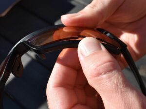 Tifosi Davos Sunglasses - after the lens is out at the bottom, push it outwards at the nose piece