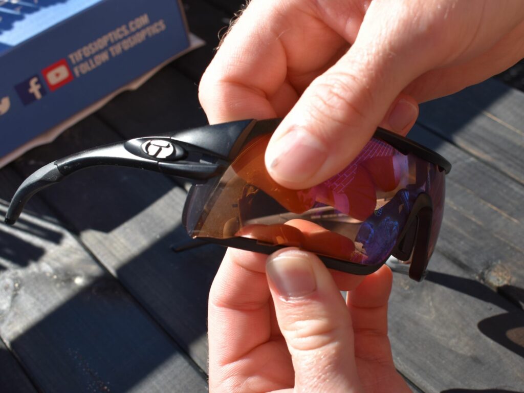 Tifosi Davos Sunglasses - stretch the frame at the bottom of each side and push the lens out there