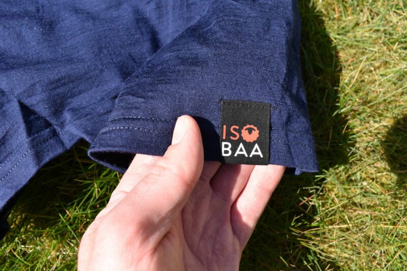 Isobaa Long Sleeve Zip Neck: Logo at the hem