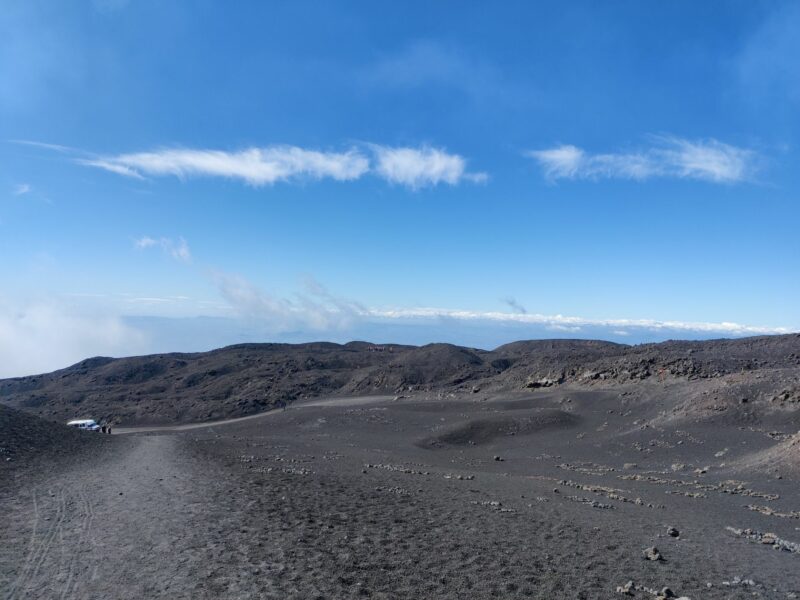 Mount Etna Hiking Trail - volcano field filled with names written with stones