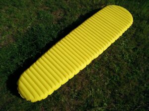 Comfort-wise inflatable sleeping pads are a clear winner. They're also warmer and thus suitable for winter, depending on the model.