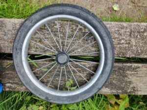 Bring a spare wheel or at least a tube and pump. Flat tires are common of non-paved trails
