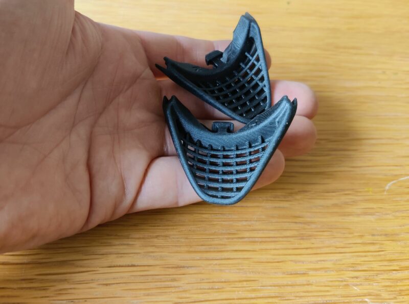 The side shields are made of soft plastic and have ventilation holes